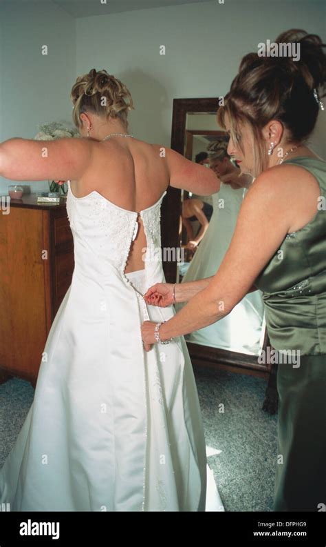 Bride Getting Dressed Stock Photo Alamy