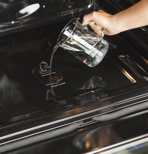 Place the cookware upside down the the top rack in the oven. Cleaning Your Oven With Steam Clean from GE Appliances ...