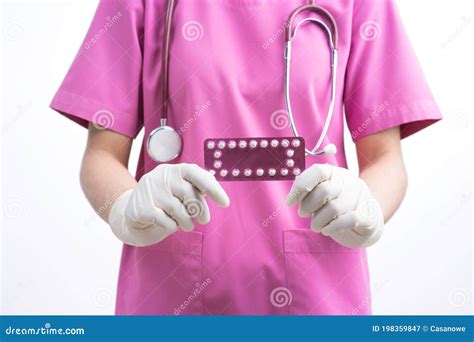 Female Doctor Holding Birth Control Pills Contraceptives In Hands For