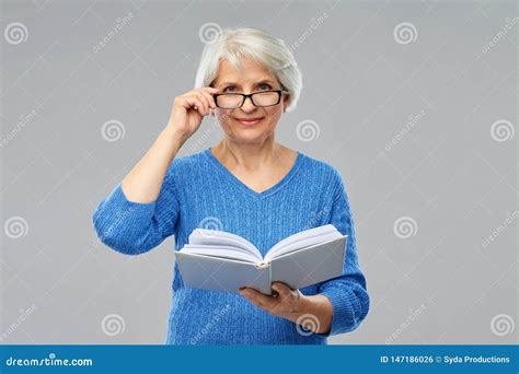 Senior Woman In Glasses Reading Book Stock Photo Image Of Nice