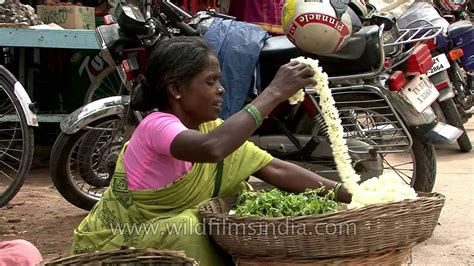 woman selling flower garlands on street in india youtube