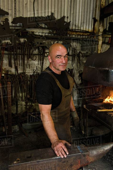 Portrait Of Blacksmith At Work Stock Photo Dissolve