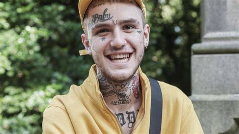 Lil Peep Is Wearing Yellow Dress And Cap In Blur Green Bokeh Background