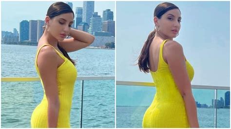 Nora Fatehi In A Sexy Yellow Figure Hugging Dress Poses For Sun Kissed Shoot In Toronto