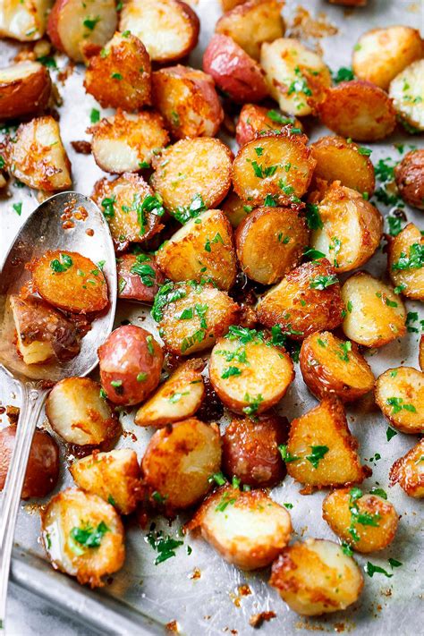 Place the potatoes chunks and garlic cloves into the boiling chicken broth and. Roasted Garlic Potatoes with Butter Parmesan - Best ...