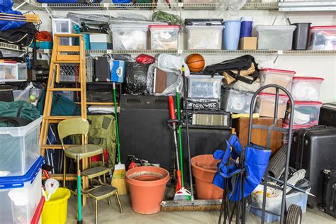 Messy Cluttered Garage Filled With Various Household Storage Ite The