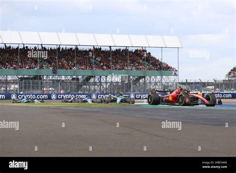 Ferraris Carlos Sainz Leads A Train Of Cars During The British Grand
