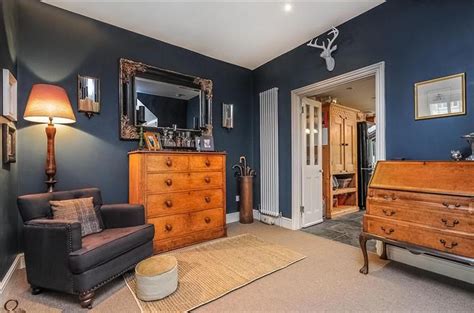 An inspirational image from Farrow and Ball | Dark walls living room