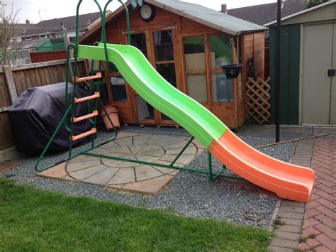 10ft Wavy Slide Green And Orange From Smyths Toys In Chellaston