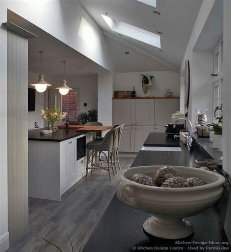 Bright sunny kitchen with vaulted ceiling and skylights old stock. Partially vaulted ceiling | Vaulted ceiling kitchen ...