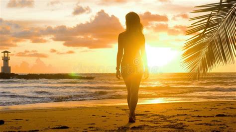 Cinematic Video Of Woman Walking On Tropical Beach On Sunset Female