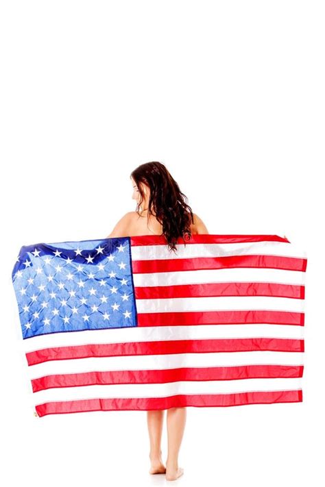 Beautiful Brunette Woman Wrapped Into American Flag Stock Photo