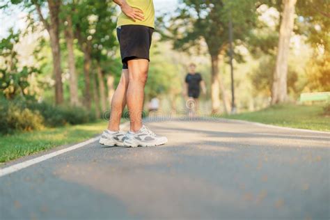 Man Jogging And Walking On The Road At Morning Adult Male In Sport