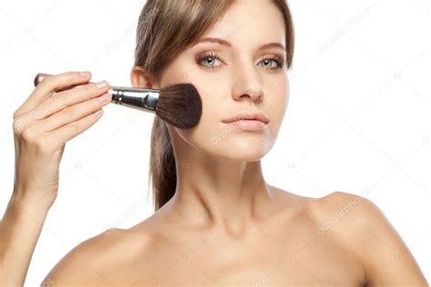 Beautiful Woman Holding Makeup Brush — Stock Photo © Chesterf 5655499