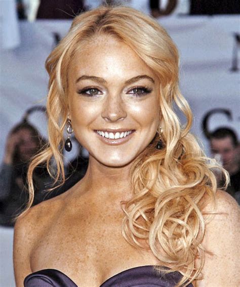 lindsay lohan long curly light blonde half up half down hairstyle
