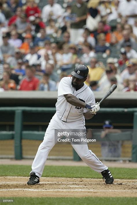 Left Fielder Dmitri Young Of The Detroit Tigers Swings At A Kansas