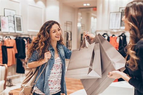 Happy Girl Shopping In The Fashion Store Stock Photo Download Image