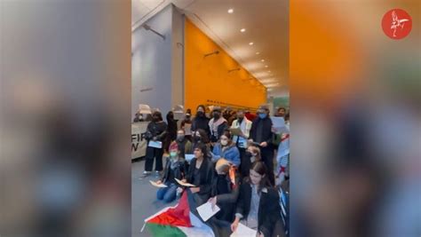 protesters stage sit in inside new york times building…