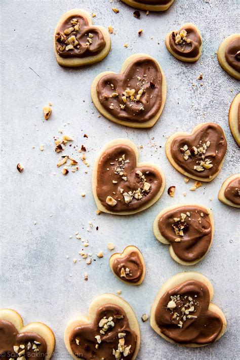 Sour cream sugar cookies with almond extract. Extremely soft and thick sugar cookies made with cream ...