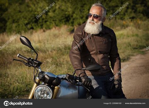 Old Biker Man Wearing Leather Jacket