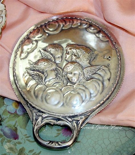 Your silver angels stock images are ready. Antique Victorian Sterling Silver Reynolds Angels Hand Mirror Wm Comyns London | Antiques, Hand ...