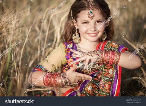 Happy Little Indian Girl Outdoors In Traditional Sari Cute Little Kid