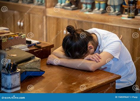 Tired Chinese Girl Sleeping At The Desk Editorial Photography Image Of Clothing Chinese