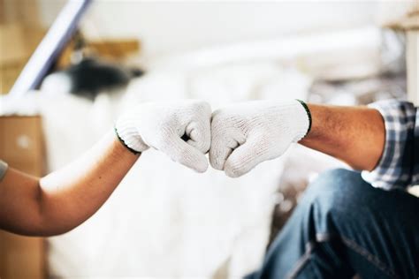 Premium Photo Couple Giving Each Other A Fist Bump