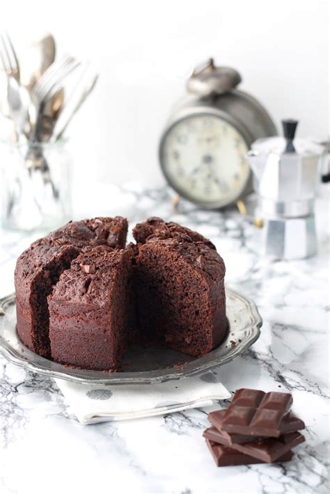 This recipe gives you three layers of decadent chocolate mousse cake. Easy No-egg Chocolate Cake Recipe | Bakery cakes, Cake ...