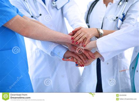 Doctors And Nurses In A Medical Team Stacking Stock Photo