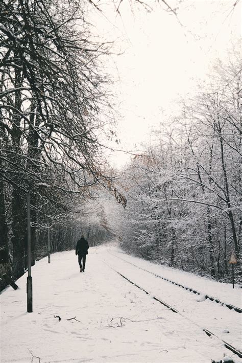 Man Walking On Snow Field · Free Stock Photo