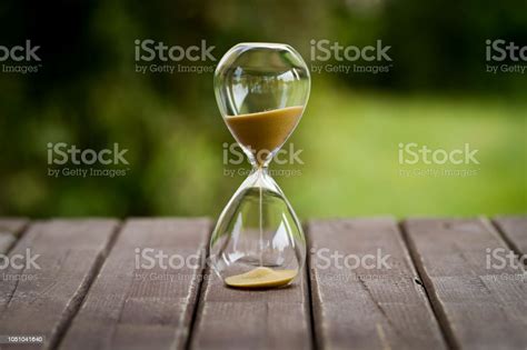 The Passage Of Time And Accumulation Time Is Money Hourglass Stock