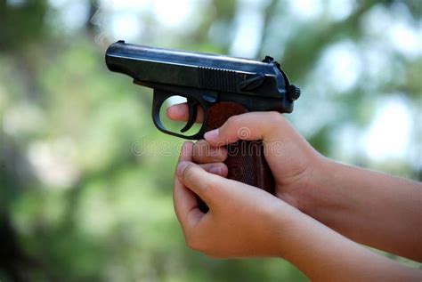 Two Hands Holding A Gun Stock Photo Image Of Iron Black 69797004