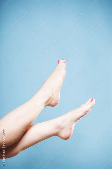 Beautiful Long Naked Woman Girl Legs On Blue Stock Photo Adobe Stock
