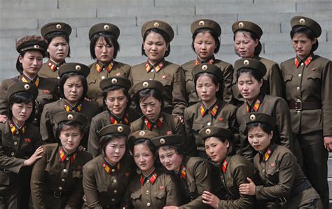 North Korean Female Soldiers Taking Pictures Stock Photo