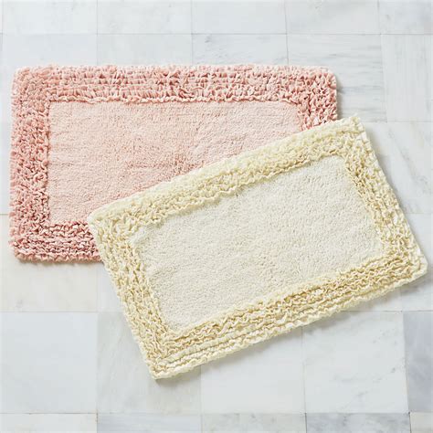 Not only will it help you express a personal style, but it also will keep your feet warm and protect you from slipping on the wet tile floor. Ruffle Border Bath Rug Collection| Bath Rugs & Bath Mats | Brylane Home