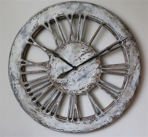 White Skeleton Wall Clock With Large Wooden Roman Numerals
