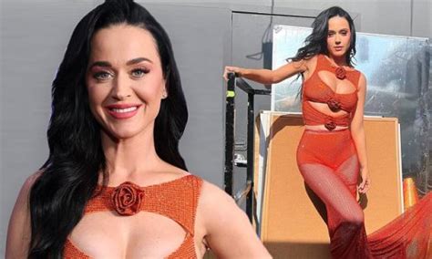 Katy Perry Stuns As She Shows Skin In A Sexy Sheer Orange Number With