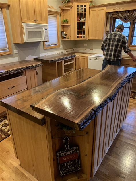 As well as the attractive butcher block countertops are made from straight cuts of wood that are glued together. Pin by Chizu Cruz on home in 2020 | Kitchens live edge ...