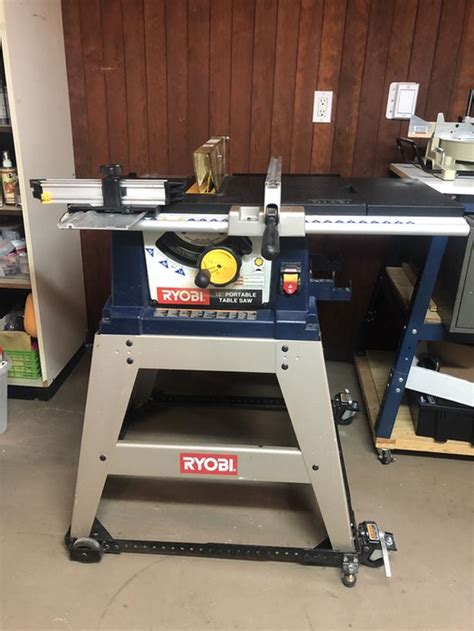 Sold Sold Ryobi Bts15 10 Table Saw On Mobile Stand With Material
