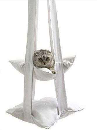 Our kitties are enjoying cat hammock! Saving Space --- hanging cat swing makes good use of ...