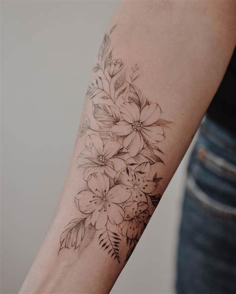 Floral Wrap Around Arm Tattoo