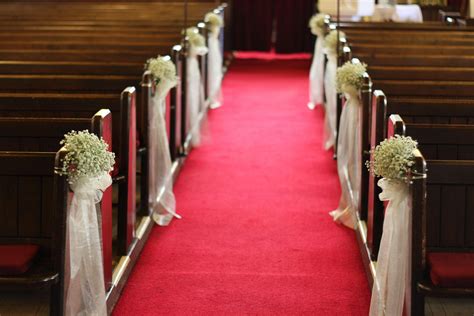 Babys Breath Pew Ends Flanking The Aisle Of The Church