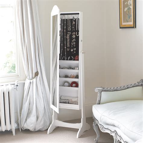This prestigious full length free standing cheval mirror with crystal border is a bejeweled mirror and space saving jewelry organizer in one. Buy Cheval Mirror Jewellery Cabinet from Pia Jewellery