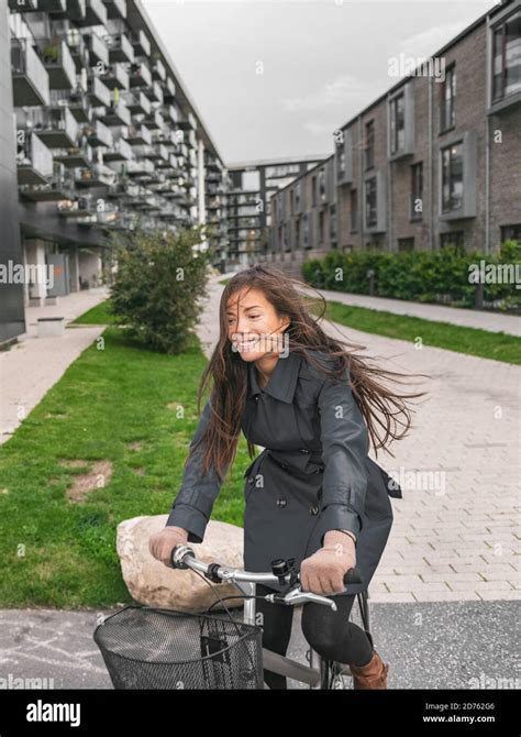 City Bike Asian Girl Happy Riding Bicycle Commuting Outside Condo Apartment Building Street