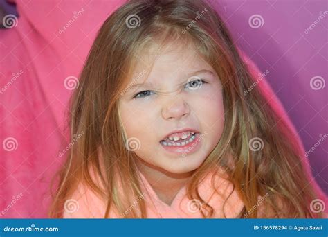 Portrait Of A Pretty Little Caucasian Preteen Girl Child With Angry