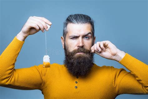 Bearded Serious Man With Tea Bag Stock Image Image Of Long Grey