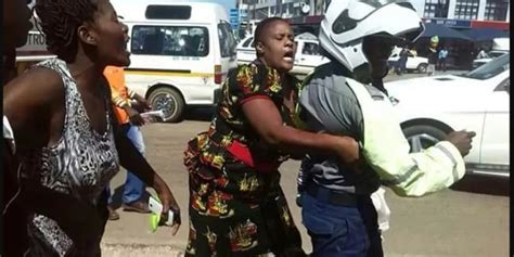 Watch Civilians Brutally Beat Up Zrp Police Officers In Messy Brawl