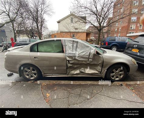 Damaged Car That Was Side Swiped At An Intersection In Brooklyn New