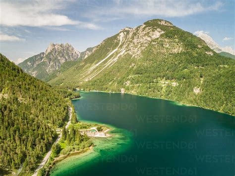 Aerial View Of Lago Del Predil Lake Surrounded By Mountains Italy